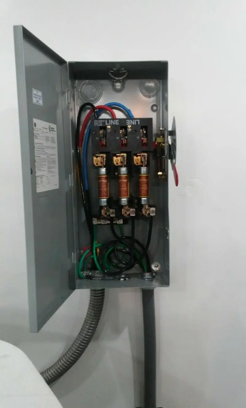 Three-phase disconnect switch installed for Smoke Detector Installation in Plainview
